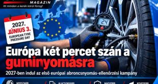 Gumiszervizes szakember digitális nyomásmérővel ellenőrzi egy személyautó gumiabroncsának nyomását.
